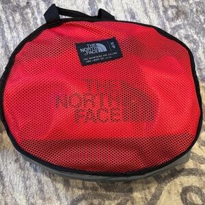The North Face Red and Black Duffel Bag